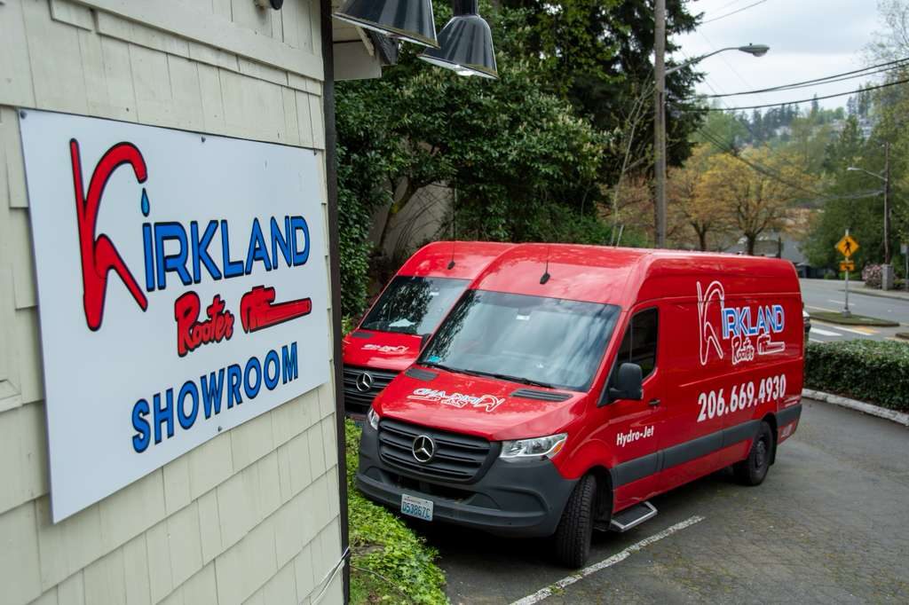 The Kirkland Rooter showroom and service vans